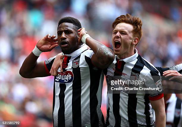 Grimsby's Omar Bogle celebrates with team mate Jon Nolan after scoring his and the teams second goal of the game during the Vanarama Football...