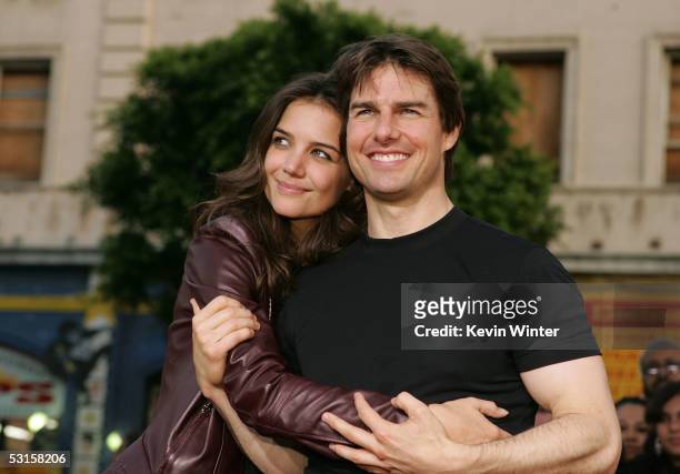 Actor Tom Cruise and actress Katie Holmes arrive at the Los Angeles Fan Screening of "War of the Worlds" at the Grauman's Chinese Theatre on June 27,...