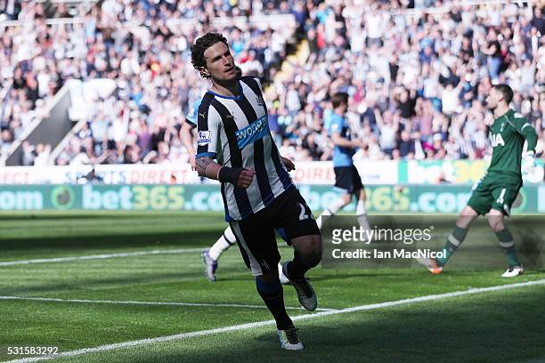 Daryl Janmaat of Newcastle United celebrates scoring his team's fifth goal during the Barclays Premier League match between Newcastle United and...