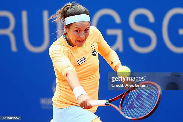 Tatjana Maria of germany returns the ball to Antonia Lottner of Germany during Day Two of the Nuernberger Versicherungscup 2016 on May 15, 2016 in...