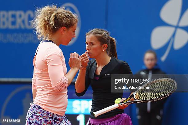 Annika Beck and Anna-Lena Friedsam of Germany talk during their match against Katharina Hobgarski and Carina Witthoeft of Germany during Day Two of...