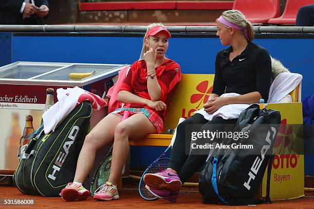 Katharina Hobgarski and Carina Witthoeft of Germany react during their match against Annika Beck and Anna-Lena Friedsam of Germany during Day Two of...