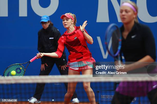 Katharina Hobgarski and Carina Witthoeft of Germany in action during their match against Annika Beck and Anna-Lena Friedsam of Germany during Day Two...