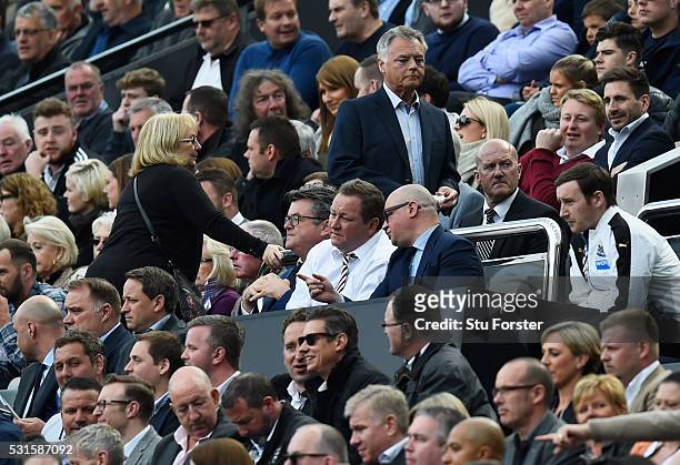 Newcastle United owner Mike Ashley talks with managing director Lee Charnley during the Barclays Premier League match between Newcastle United and...