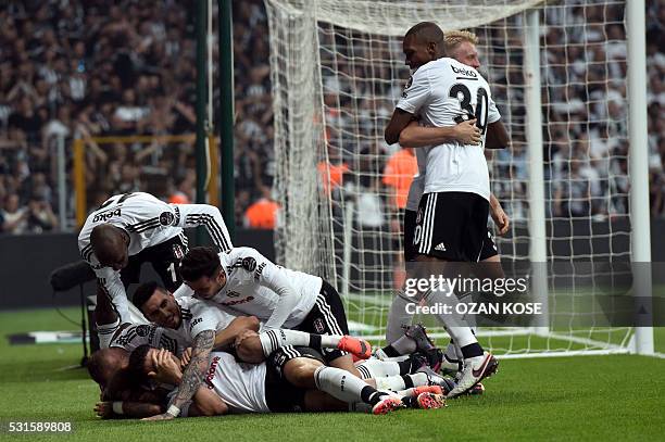 Besiktas' team celebrates after their German forward Mario Gomez scored a goal during the Turkish Spor Toto Super league football match between...