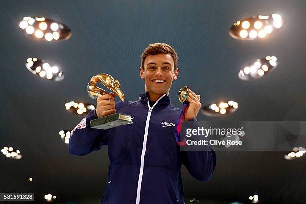 Tom Daley of Great Britain poses with his LEN 'Best Diver' award and gold medal after winning the Men's 10m Platform Final on day seven of the 33rd...