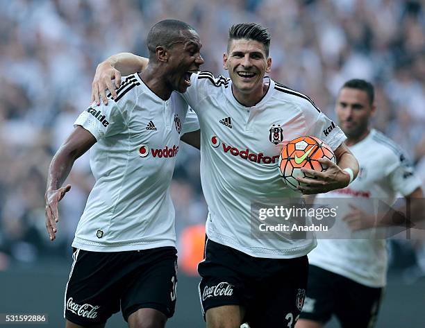 Marcelo of Besiktas celebrates his score with his team mate Mario Gomez during the Turkish Spor Toto Super Lig soccer match between Besiktas JK and...