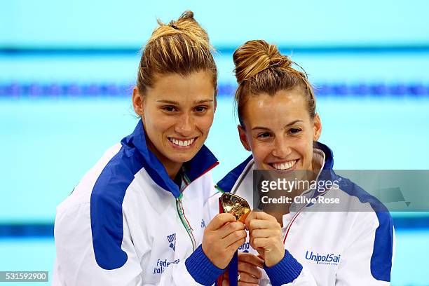 Tania Cagnotto and Francesca Dallape of Italy pose with their gold medal after winning the Women's 3m Synchro Final on day seven of the 33rd LEN...
