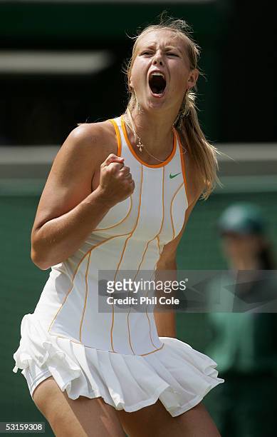 Maria Sharapova of Russia celebrates winning a point against Nadia Petrova of Russia during the eighth day of the Wimbledon Lawn Tennis Championship...