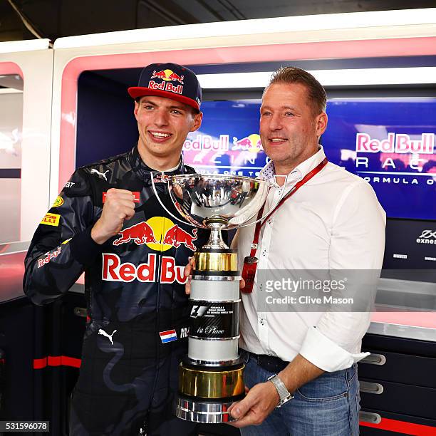 Max Verstappen of Netherlands and Red Bull Racing celebrates his first F1 win with his father, Jos Verstappen during the Spanish Formula One Grand...