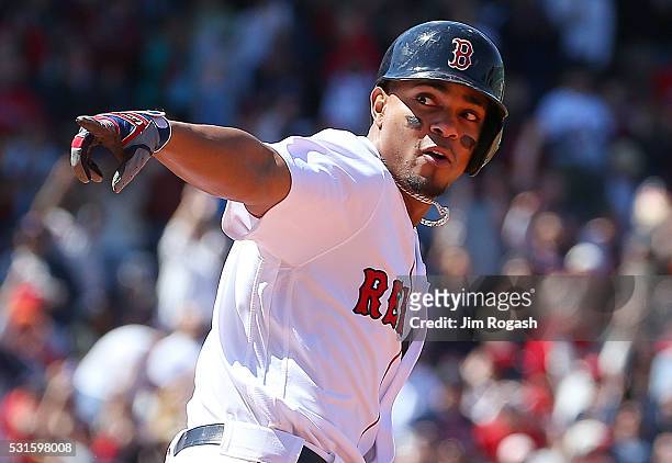Xander Bogaerts of the Boston Red Sox reacts toward the dugout after his three run home run in the second inning against the Houston Astros at Fenway...