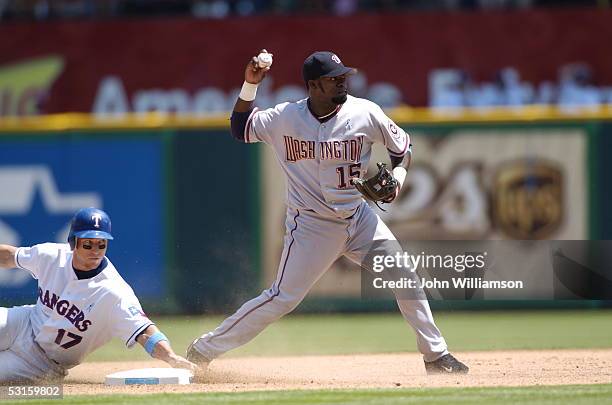 Shortstop Cristian Guzman of the Washington Nationals fields his position during the game against the Texas Rangers at Ameriquest Field in Arlington...