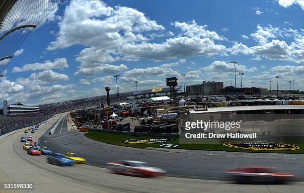General view of cars racing during the NASCAR Sprint Cup Series AAA 400 Drive for Autism at Dover International Speedway on May 15, 2016 in Dover,...