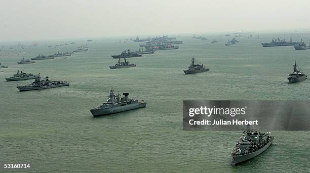 Ships lie at anchor in The Solent during The Fleet Review by Her Majesty The Queen on June 28, 2005 in Portsmouth, England. Aproximately 165 ships...