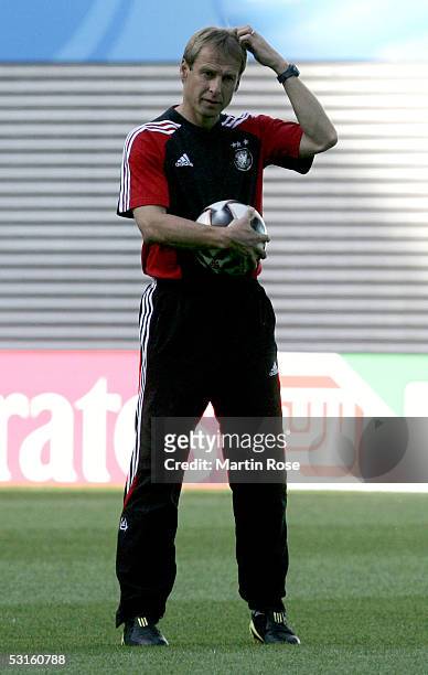 Juergen Klinsmann head coach of Germany talks to gestures during the training session of the German National Team for the Confederations Cup 2005 on...