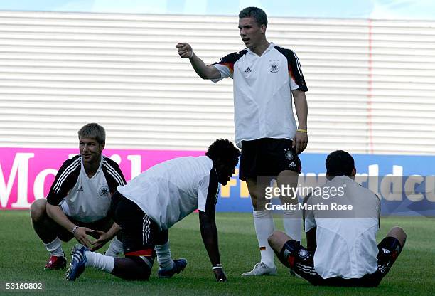 Lukas Podolski of Germany gestures during the training session of the German National Team for the Confederations Cup 2005 on June 28, 2005 in...