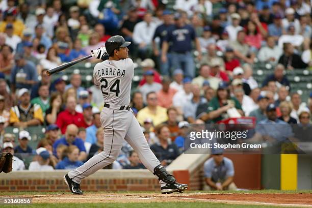 Miguel Cabrera of the Florida Marlins bats during the game against the Chicago Cubs at Wrigley Field on June 15, 2005 in Chicago, Illinois. The...