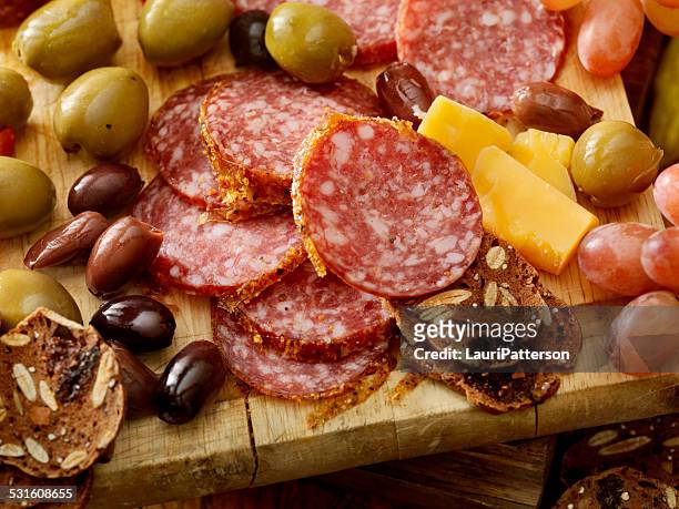 charcuterie board - salami stock pictures, royalty-free photos & images