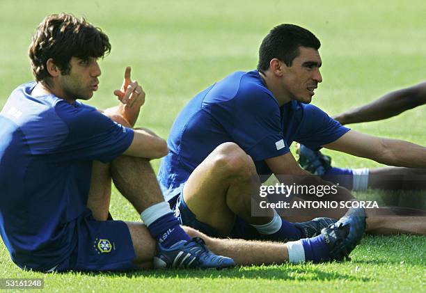 Germany: Brazilian midfielder Juninho and defender Lucio relax during a training session, 28 June 2005 at the Waldstadion in Frankfurt, one day...
