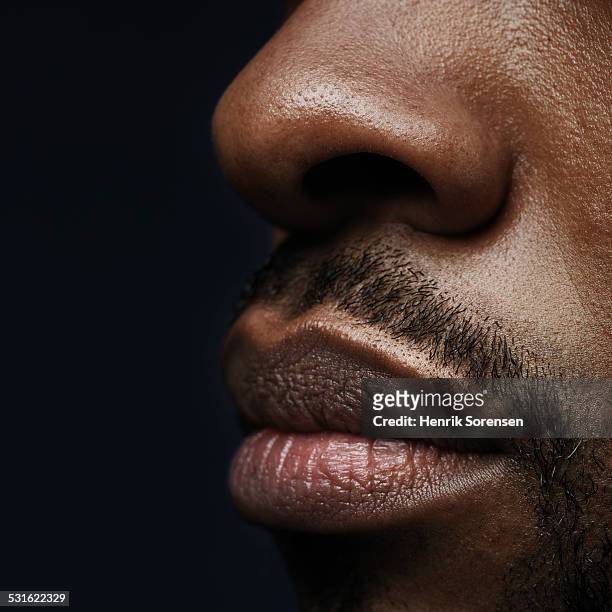 close up of man lips - nozes stock pictures, royalty-free photos & images