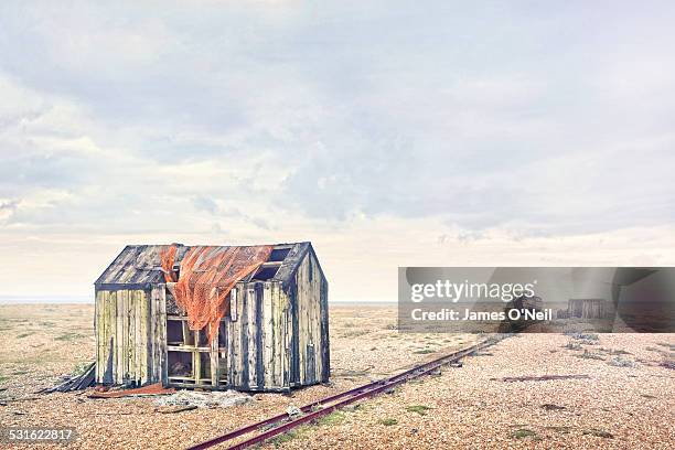 derelict shed at dungeness - abandoned boat stock pictures, royalty-free photos & images