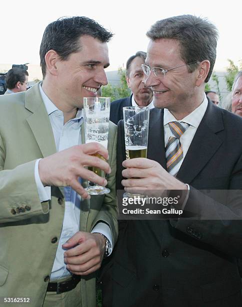 German politician Guido Westerwelle and his partner Michael Mronz attend the Bild Summer Party at the Axel Springer publishing house June 28, 2005 in...