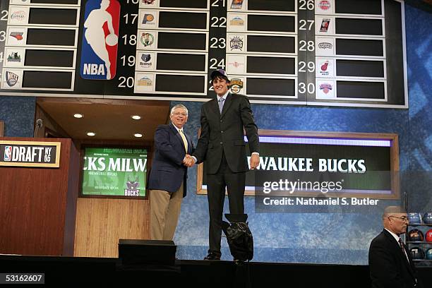 Andrew Bogut shakes hands with NBA Commissioner David Stern after being selected first overall by the Milwaukee Bucks in the 2005 NBA Draft on June...