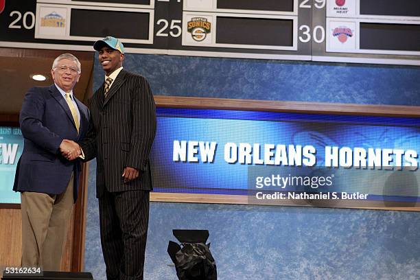 Chris Paul shakes hands with NBA Commissioner David Stern after being selected fourth overall by the New Orleans Hornets during the 2005 NBA Draft on...