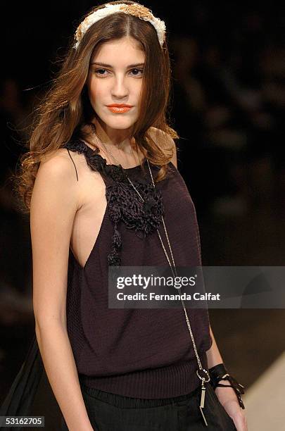 Model walks down the runway at the Patachou Por Tereza Santos Summer 2006 fashion presentation during Sao Paulo Fashion Week June 28, 2005 in Sao...