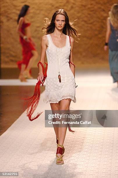 Model walks down the runway at the Patachou Por Tereza Santos Summer 2006 fashion presentation during Sao Paulo Fashion Week June 28, 2005 in Sao...