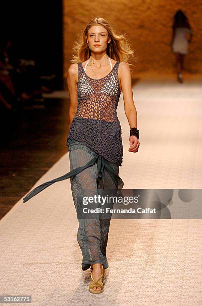 Model walks down the runway at the Patachou Por Tereza Santos Summer 2006 fashion presentation during Sao Paulo Fashion Week June 28, 2005 in Sao...