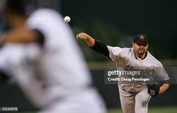 Starting pitcher Roger Clemens of the Houston Astros delivers a pitch against Jorge Piedra of the Colorado Rockies at Coors Field on June 28, 2005 in...