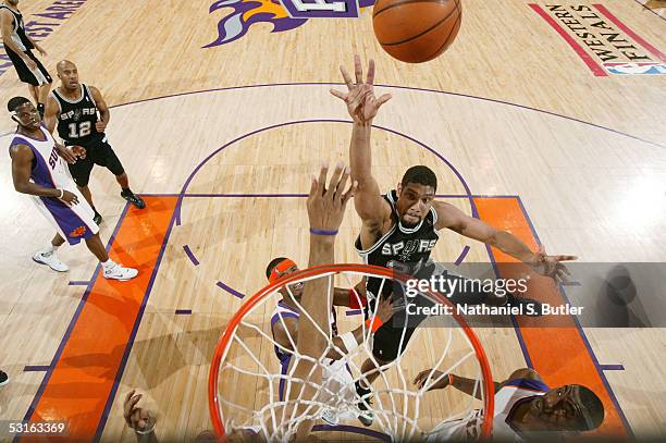 Tim Duncan of the San Antonio Spurs shoots a layup against the Phoenix Suns in Game five of the Western Conference Finals during the 2005 NBA...