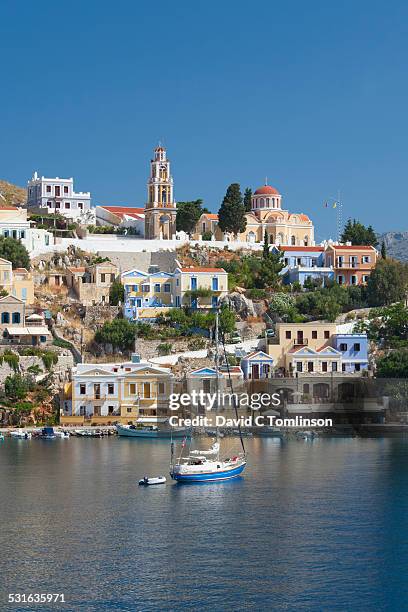 view across the tranquil harbour, gialos, symi - rhodes stockfoto's en -beelden