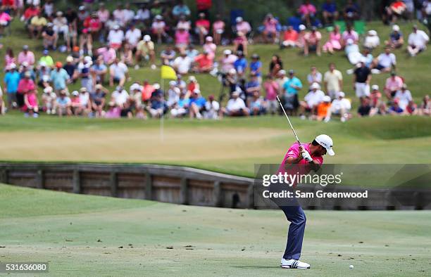 Jason Day of Australia plays a shot on the fourth hole during the final round of THE PLAYERS Championship at the Stadium course at TPC Sawgrass on...