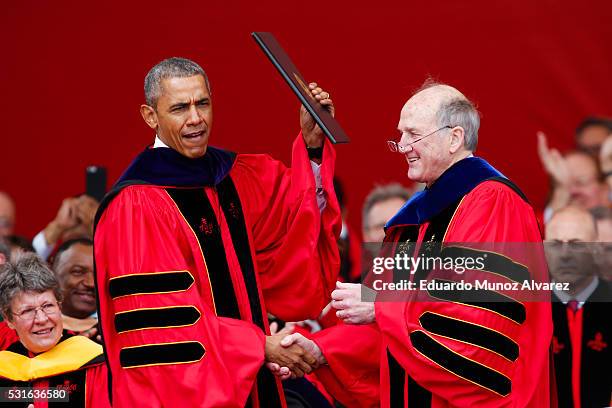 President Barack Obama reacts after receiving an honorary doctorate of laws from President of Rutgers University, Robert Barchi during the 250th...