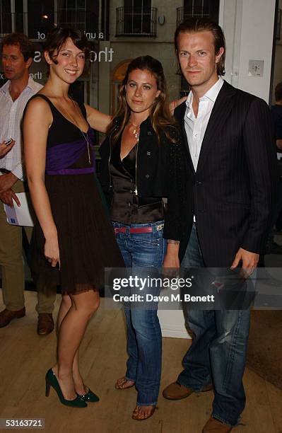 Margo Stilley, Francesca Versace and Nick Saunders attend the Private View for "The Sixties Set: An Inside View By Robin Douglas-Home" at The Air...