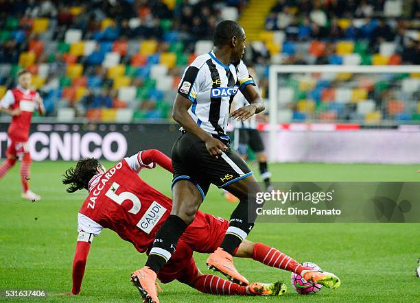 Duvan Zapata of Udinese Calcio competes with Cristian Zaccardo of Carpi FC during the Serie A match between Udinese Calcio and Carpi FC at Stadio...