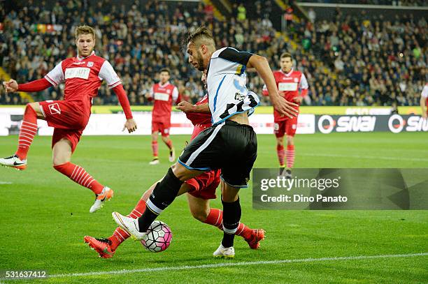 Khadim Ali Adnan of Udinese Calcio competes with Cristian Zaccardo of Carpi FC during the Serie A match between Udinese Calcio and Carpi FC at Stadio...
