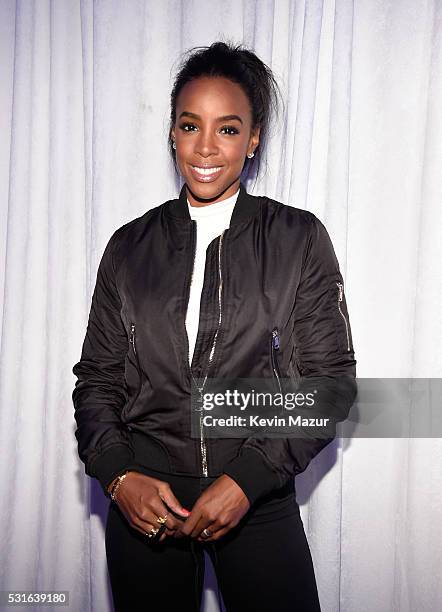 Singer Kelly Rowland poses backstage during "The Formation World Tour" at the Rose Bowl on May 14, 2016 in Pasadena, California.