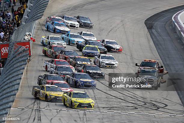 Cars stop on the track during a red flag during the NASCAR Sprint Cup Series AAA 400 Drive for Autism at Dover International Speedway on May 15, 2016...