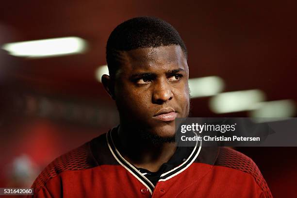 Starting pitcher Rubby De La Rosa of the Arizona Diamondbacks watches from the dugout during the first inning of the MLB game against the San...