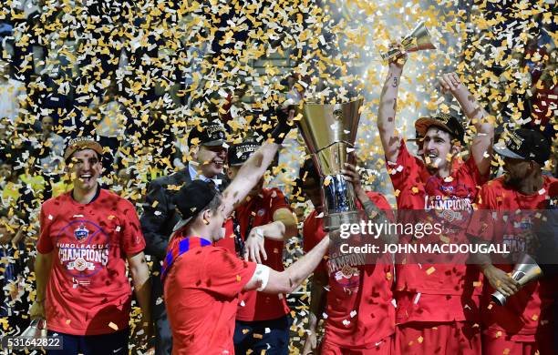 Moscow players celebrate after winning the final at the Euroleague Final Four in Berlin on May 15, 2016. CSKA Moscow defeated Fenerbahce Istanbul 101...