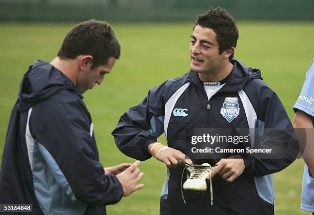 Danny Buderus and Anthony Minichiello talk during an NRL New South Wales Blues team training session at the Randwick Barracks June 29, 2005 in...