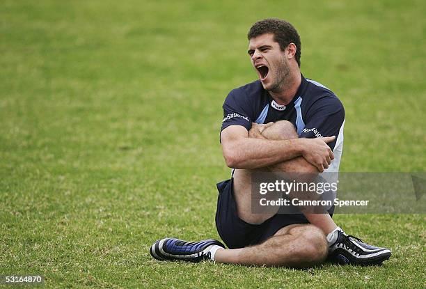 Matt King stretches during an NRL New South Wales Blues team training session at the Randwick Barracks June 29, 2005 in Sydney, Australia.