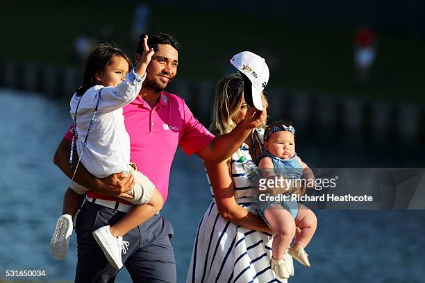 Jason Day of Australia celebrates with son Dash, wife Ellie and daughter Lucy after winning during the final round of THE PLAYERS Championship at the...