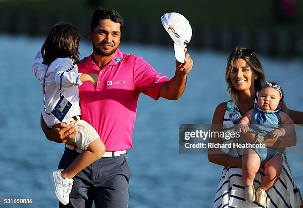 Jason Day of Australia celebrates with son Dash, wife Ellie and daughter Lucy after winning during the final round of THE PLAYERS Championship at the...