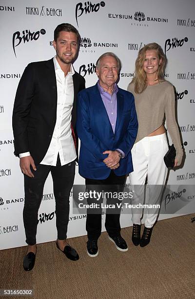 Guest, Tim Headington and Toni Garrn attend Tim Headington & Elysium Bandini Present The 8th Annual PARADIS Benefitting The Art of Elysium during the...