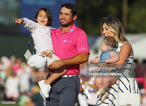 Jason Day of Australia celebrates with son Dash, wife Ellie and daughter Lucy after winning during the final round of THE PLAYERS Championship at the...