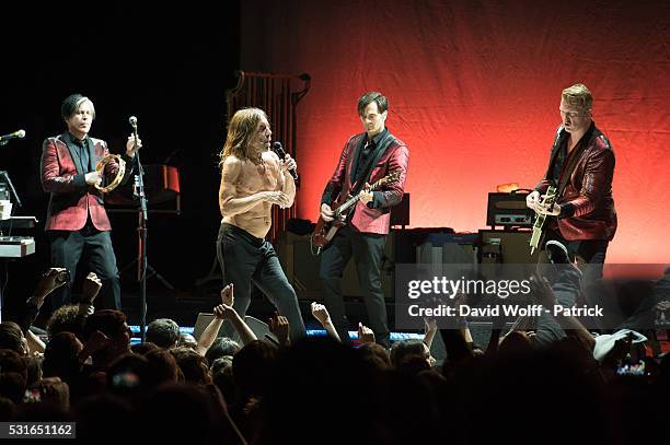 Troy Van Leeuwen, Iggy Pop, Dean Fertita, and Josh Homme from Post Pop Depression perform at Le Grand Rex on May 15, 2016 in Paris, France.